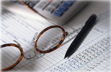 Spreadsheet with Calculator, Pen and Glasses Spreadsheet with Calculator, Pen and Glasses